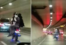 avrasya tunelinde tehlikeli seyahat 1i bebek 3 kisi motosiklet uzerinde Qei45qCw