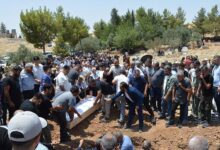 izmirde olen 3 kardes mardinde yan yana topraga verildi q43L8D9O