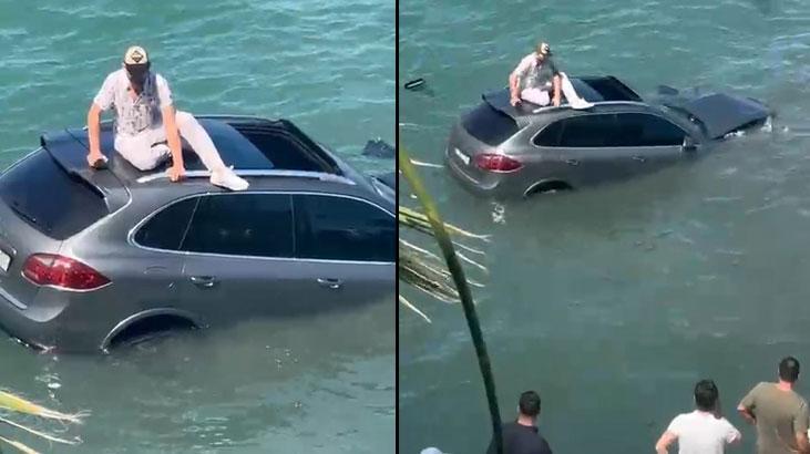 Arabasıyla denize uçtu, dakikalarca batan aracın üzerinde kurtarılmayı bekledi 1 arabasiyla denize uctu dakikalarca batan aracin uzerinde kurtarilmayi bekledi QXIdeCTd